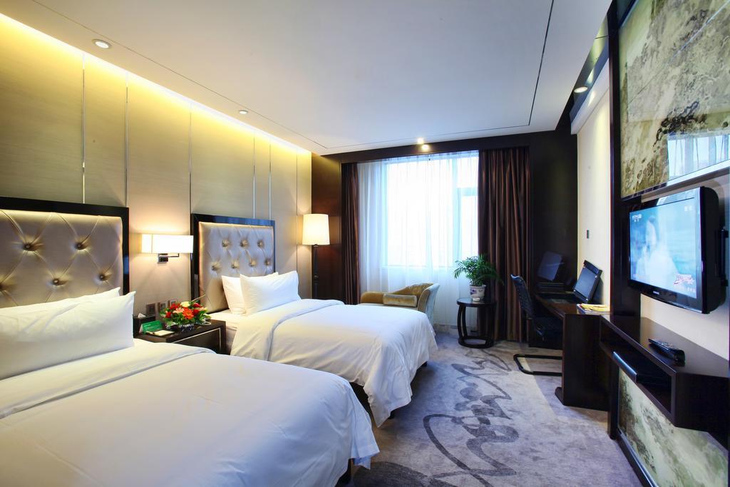 Xichang Minshan Hotel Chambre photo