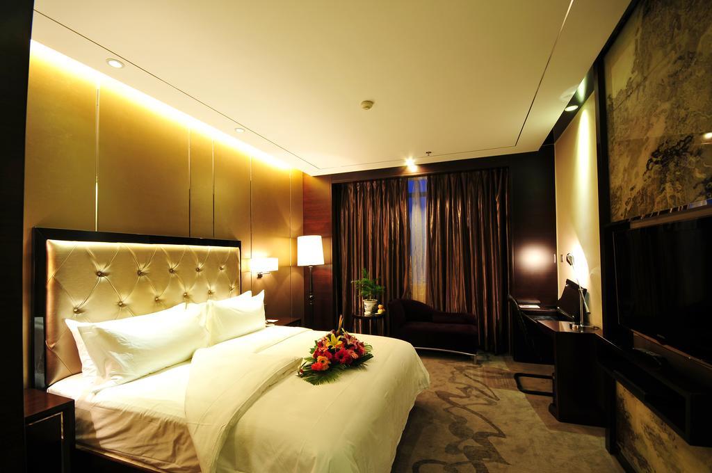 Xichang Minshan Hotel Chambre photo