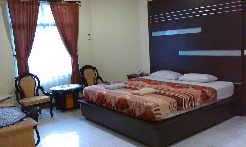 Hotel Venus Kencana Makassar Chambre photo