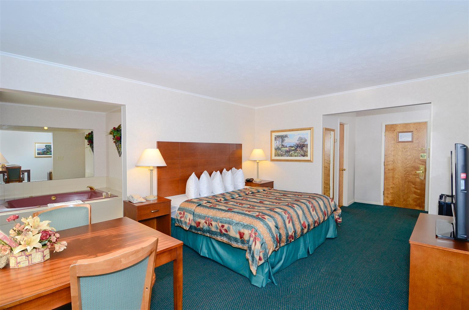 Magnuson Grand Pioneer Inn And Suites Escanaba Chambre photo